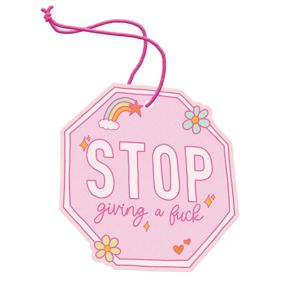 Pink stop sign air freshener with hearts, flowers, and stars with "STOP Giving A Fuck" on it.