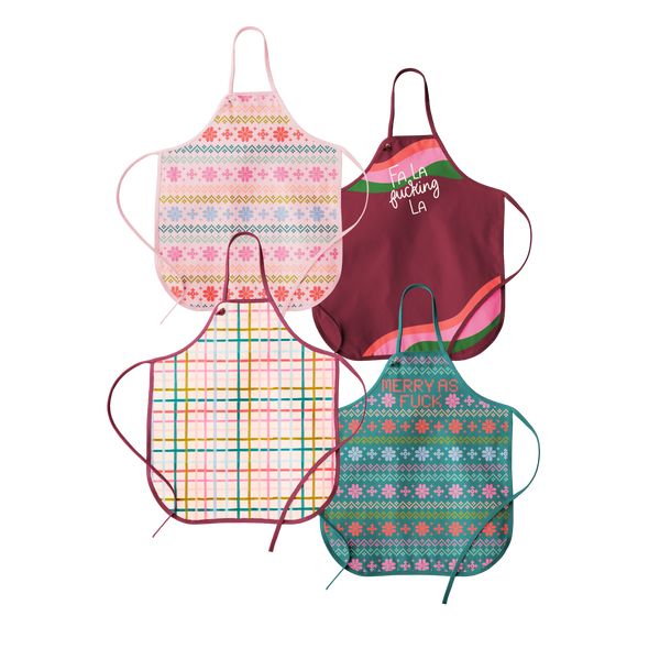 Multicolored holiday aprons. Apron that says "Fa La fucking La"