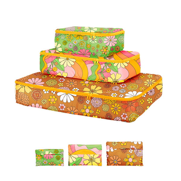 small, medium, and large packing cube set which folds into a pouch. All with floral prints, one with green, one pink, and one brown.