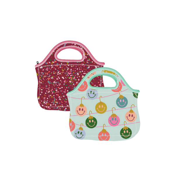 medium soft handbag with handles maroon with multi-color confetti. one medium soft hand bang with handles with blue backgroun and multi-color smiling lightbulbs.