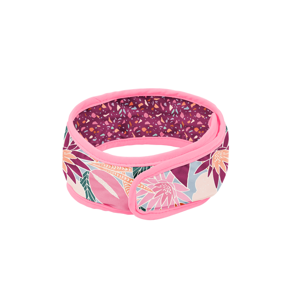 PNG image of Floral Days Spa Head Wrap. The head wrap has a pink trim, and a floral pattern all over. Inside, there is a cranberry speckle pattern. 