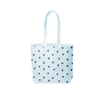 a light blue canvas tote with triangles