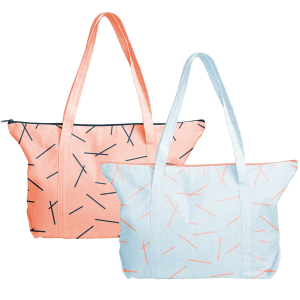 Cute tote bags in light denim with peach pixie sticks and peach canvas with navy blue pixie sticks. 