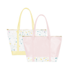 two vegan leather weekend bags. one with yellow straps and splatter all over. one pink with splatter on the bottom