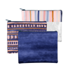 3 rectangle pouches. Top pouch is vinyl with a multicolored line design in pastels on the top of the pouch. The middle pouch is an indigo blue color with pink and tan abstract designs. Bottom pouch is a tie dye-like pouch in indigo blue.