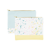 Two large makeup pouches; one white with paint splatter print and a yellow trimmed bottom and the other powder blue with white paint splatter trim along the bottom.