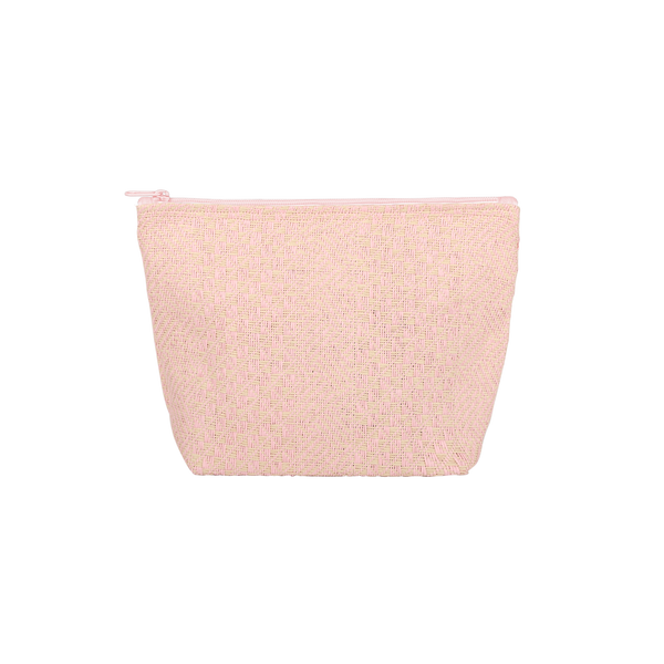 A pink and cream cross-stitched-like bag that is a puff trapezoid shape.