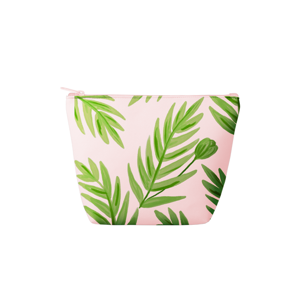 A blush pink pouch with green leaves and stems printed on.