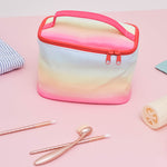 Cute cosmetics case with rainbow ombre print. -- Meltdown