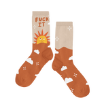 Long socks with a sun rise and the phrase "Fuck it" displayed are the top of the sock. Lower part of the sock is brown with clouds and sparkle stars.