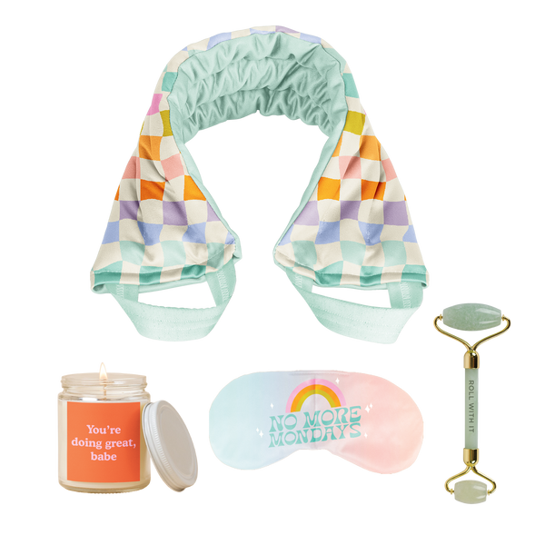 Colorful checkers weighted neck wrap and a "no more mondays" eye pillow with a "you're doing great, babe" orange candle and a face roller.