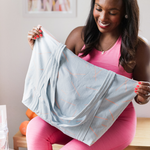 Cute tote bag in beachwash denim canvas with peach zippered top and double shoulder straps.