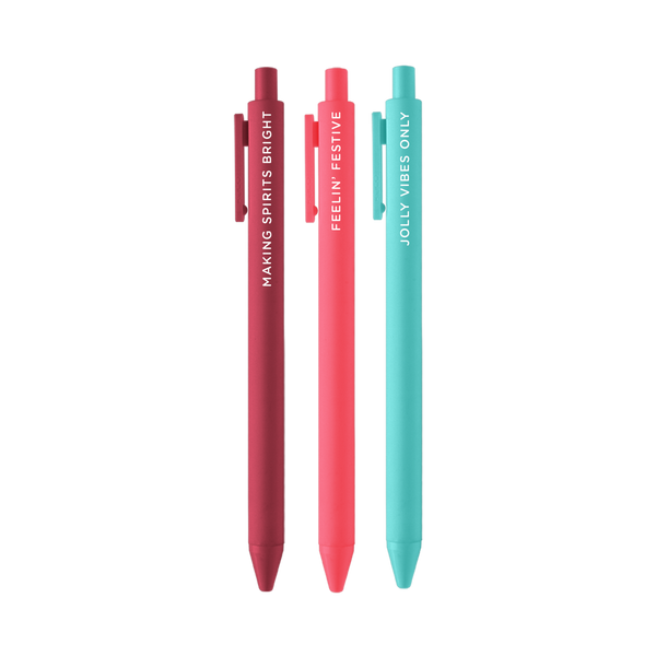 3 pack Jotter set with maroon jotter with text "making spirits bright", coral jotter with text "feelin' festive", and bright blue jotter with text "jolly vibes only"