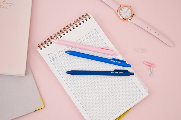 cute jotter pens laying on a taskpad