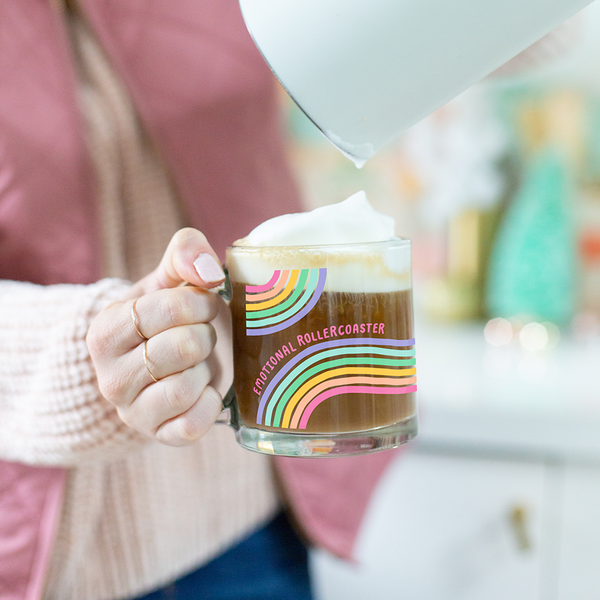 a cute glass mug with wavy lines that says emotional rollercoaster