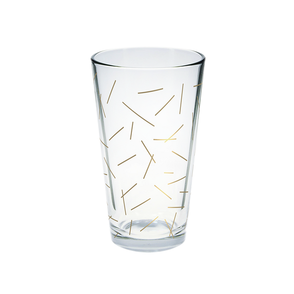 Clear glass pint glass with gold pixie sticks pattern.