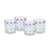 Clear glass cups with a funky checker pattern in cool colors of purple and blue.