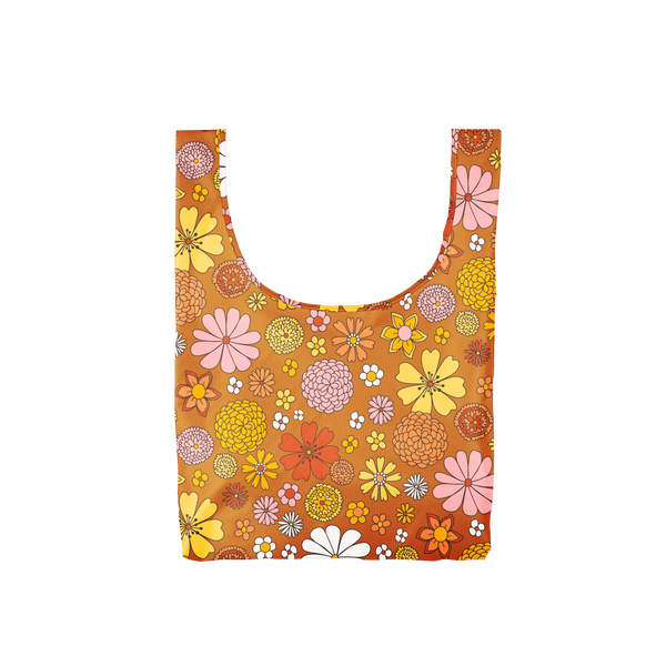 A medium, burnt orange reusable tote with yellow, white, pink and multi-colored flowers.