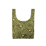 An olive green, medium sized tote bag with female faces printed on in white lines that are not connected.