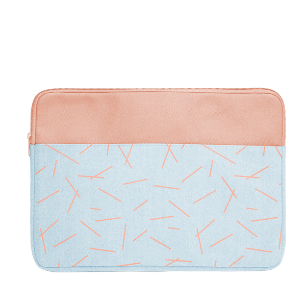 Pixie Sticks Canvas Laptop Sleeve is a cute laptop sleeve in light denim with peach pixie sticks pattern in 15 inch size.