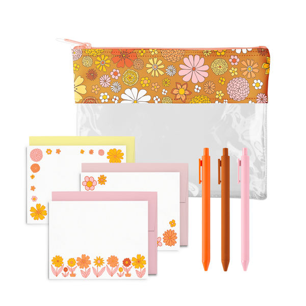 Cute colorful stationery kit with a pouch that has a floral print, three jotter pens and a set of letterpress greeting cards with flower art and complementary envelopes.