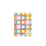 Multi color checkered cover with white daisys and a small print "creative flow" on the bottom right corner.