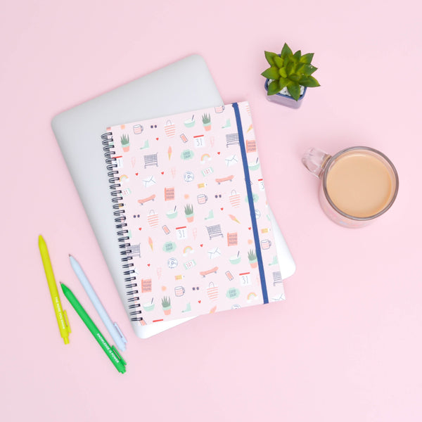 Lucky charms planner on top of a macbook