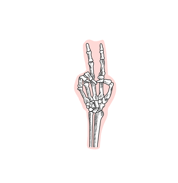 light pink sticker with skeleton hand peace sign