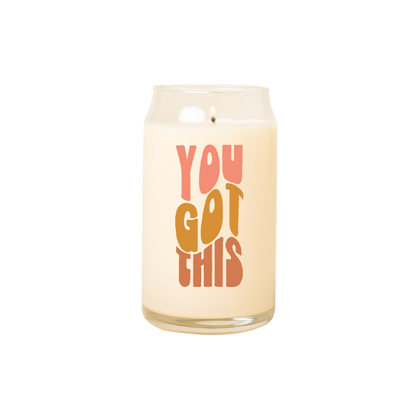 A 16 oz. candle with "You got this" printed on in bubbled lettering.