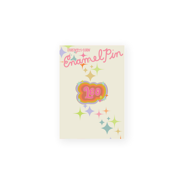 A Leo Zodiac Enamel Pin in hot pink lettering with a light mauve background. Perimeter lining of pin is lilac, pastel green, and orange.