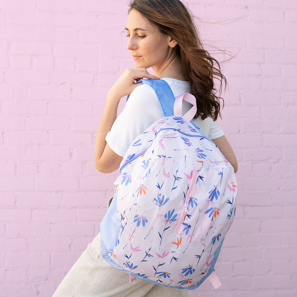 Ripstop back pack with our magic sprigs pattern that folds into a pouch. 