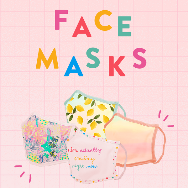 A pink grid background with four patterned face masks